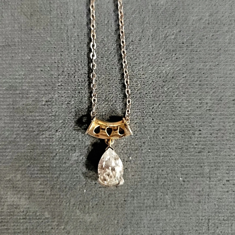 BRILLIANT SHINE IN THIS LARGE TEARDROP QUALITY CUBIC ZIRCONIA  CASUAL TO DRESS T